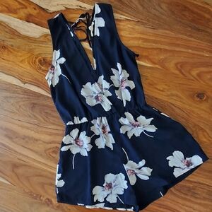 Navy floral low v cut romper